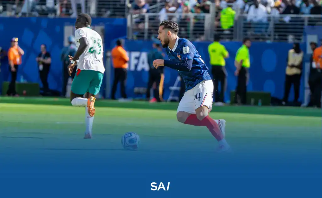Rayan Cherki on the ball for France, advised by Moussa Sissoko since 2024.